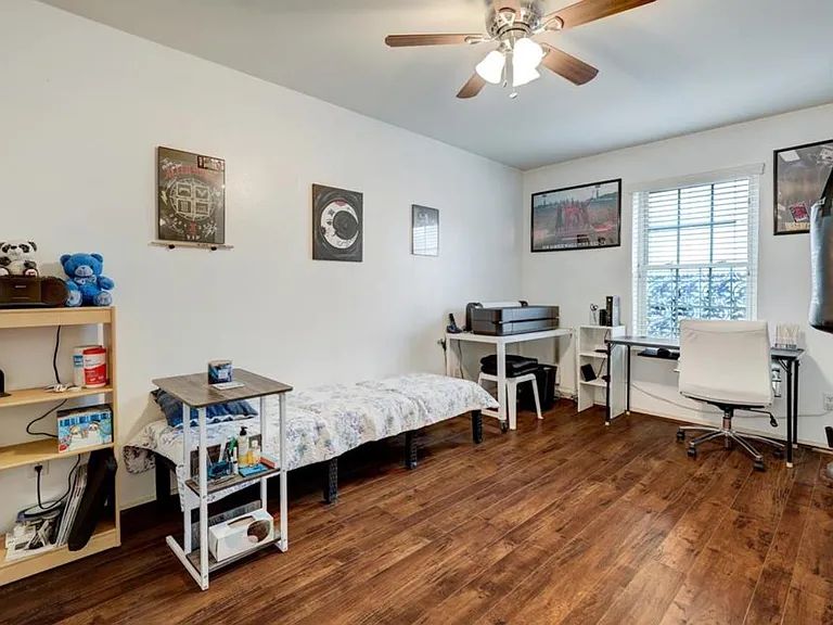 Secondary bedroom with ensuite bathroom and roomy walk in closet.