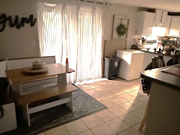 Dining room looking into kitchen