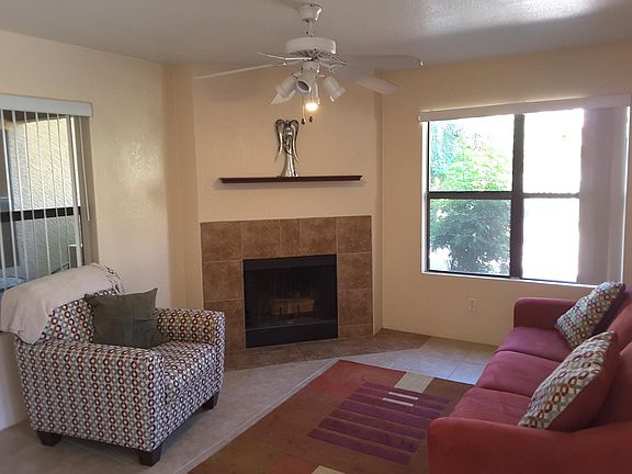 Overlook the pool and patio, in the quiet first floor unit.