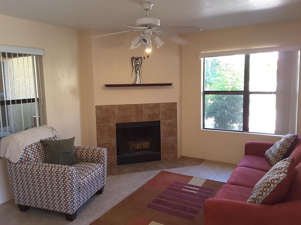 Overlook the pool and patio, in the quiet first floor unit.