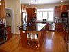 Double Ovens, Gas Cooktop , Breakfast Bar, Wine Cooler