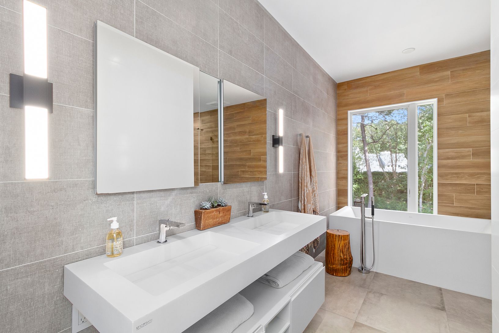Upstairs primary bath with smart features, a heated shaving mirror, remotely programmable shower