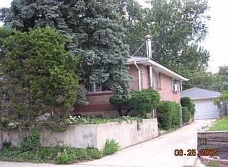 441 Harvard Lane basement apartment entry is at back of house