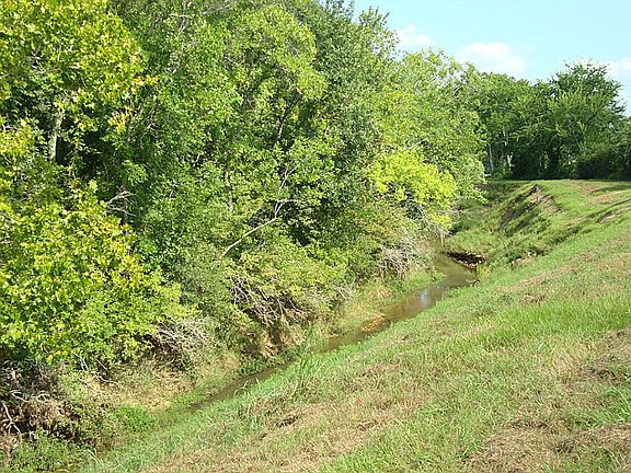 The bayou that runs at the back of the property adds to the privacy you will enjoy!
