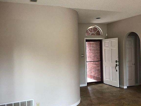 Living Room with Overhead Track Lighting.