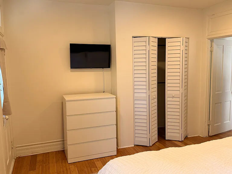 Second bed with closet/dresser and tv