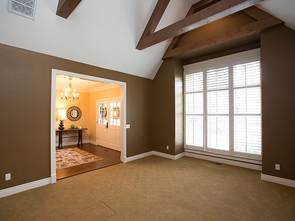 Formal living w/beamed ceiling