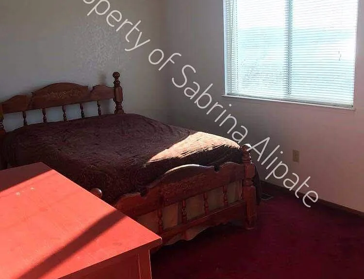 Upstairs bedroom facing water.