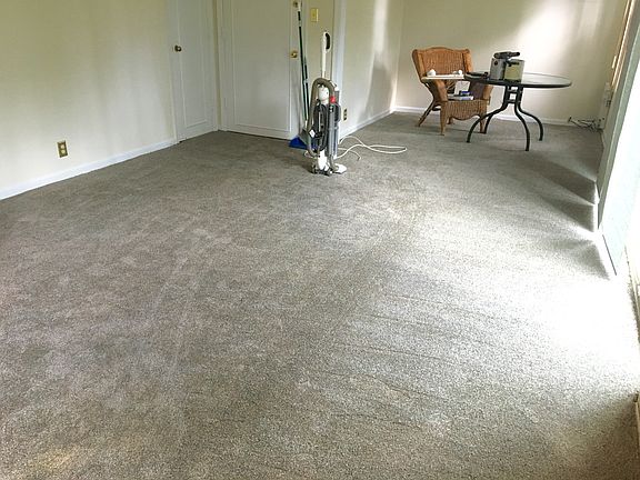 HUGE living room area with balcony