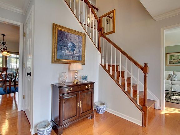 Another view of the foyer. Looking into the eating area of the kitchen and the formal living room, or study.