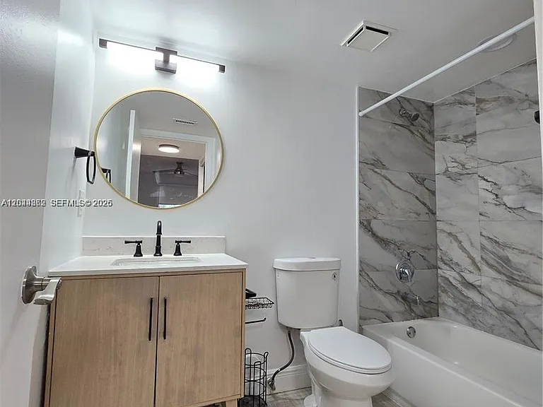 2890 N Oakland Forest Dr #102 — Photo 7