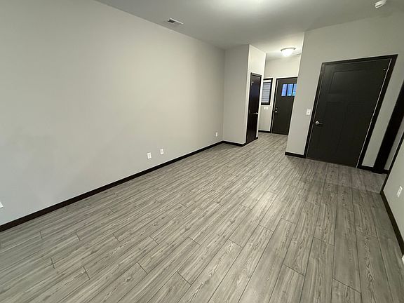 Living Room (accesses ML Bathroom, Study Nook & Garage)