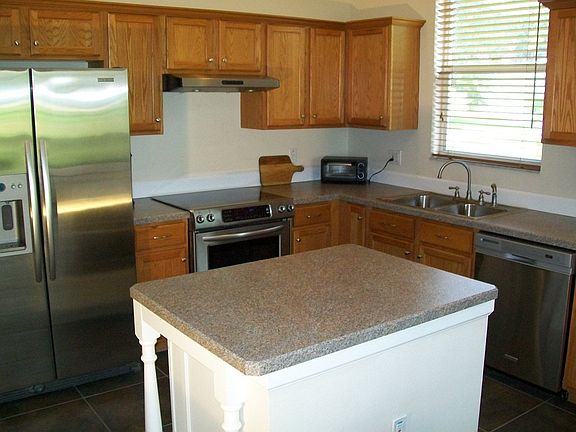 Roomy kitchen w/ SS Appliances open to Family Rm.
