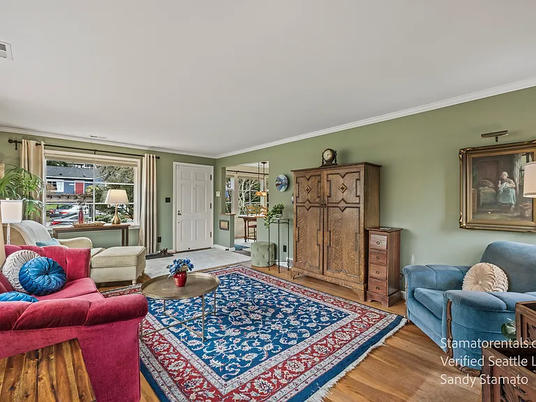 Original artwork adds character and a touch of classic charm to the living room