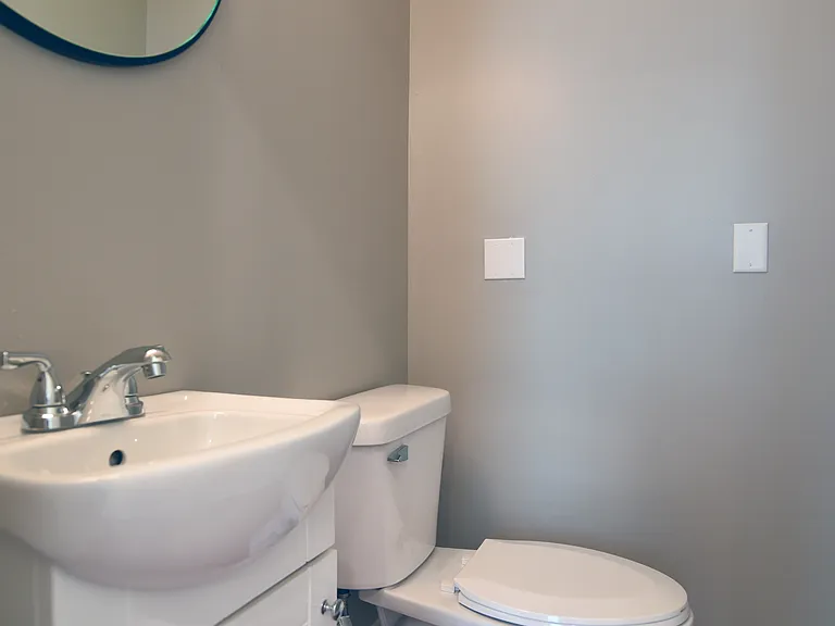Lower level powder room.