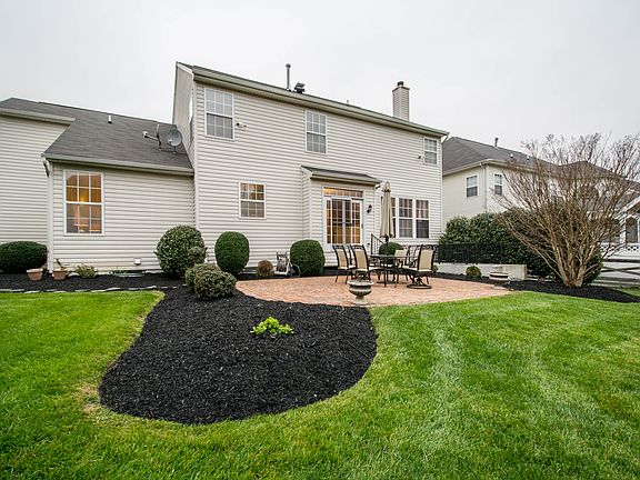 rear patio and fenced yard
