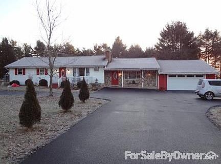 front of house
						:
						newly paved driveway