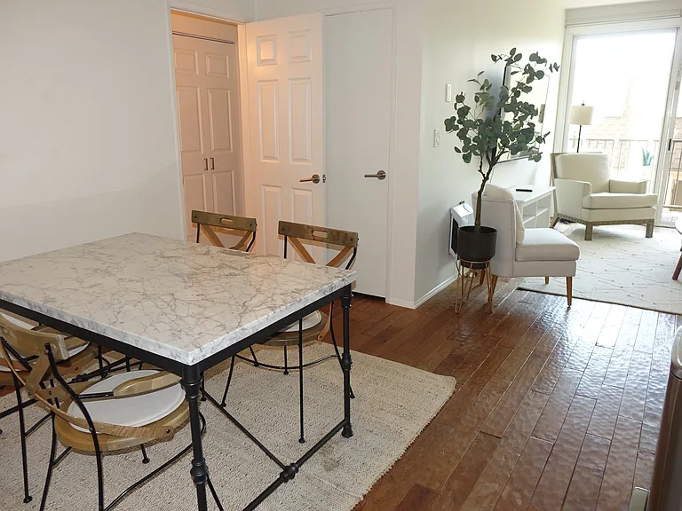 Dining Area with Teak Wood flooring