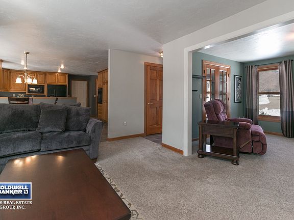 Open to kitchen and formal dining