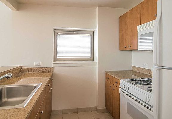 5th image of 400 W 37th St APT 8T