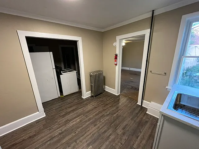 Kitchen (old appliances are in the background in the dining room waiting to be taken away