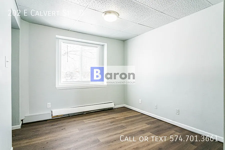 Building Photo - 202 E Calvert St #D