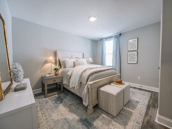 Secondary bedroom in the Coral floorplan at a Meritage Homes community in Gulfport, MS.