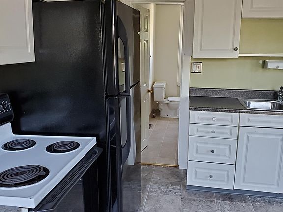 Stove & refrigerator included.