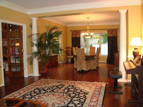 spacious living/dining area with wide plank hardwood floor