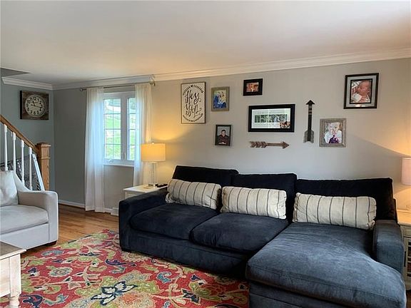 Light and Bright Living room greets you when you walk in the front door.