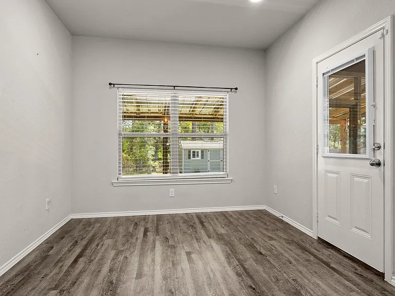 BREAKFAST NOOK, WITH ACCESS TO SCREENED BACK PORCH AND BACKYARD