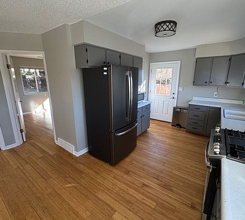 Sunlit kitchen with new appliances