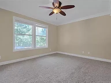 Spacious Master bedroom provides tons of natural lighting.