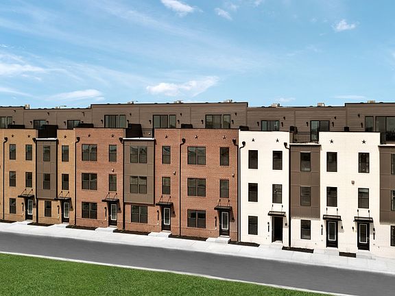 Exterior view of row of townhomes including the Bridgton at Locke Landing in Baltimore, MD featuring