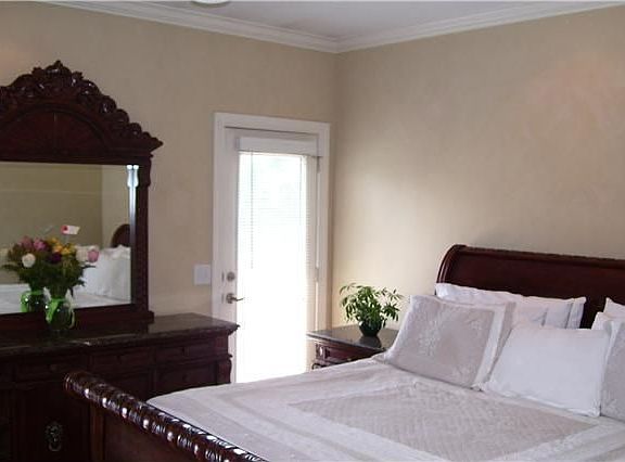 Main level master bedroom suite with private door to deck 