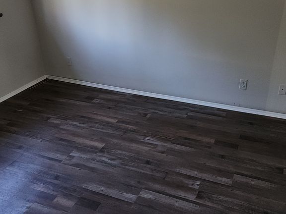 Updated flooring in bedrooms too.