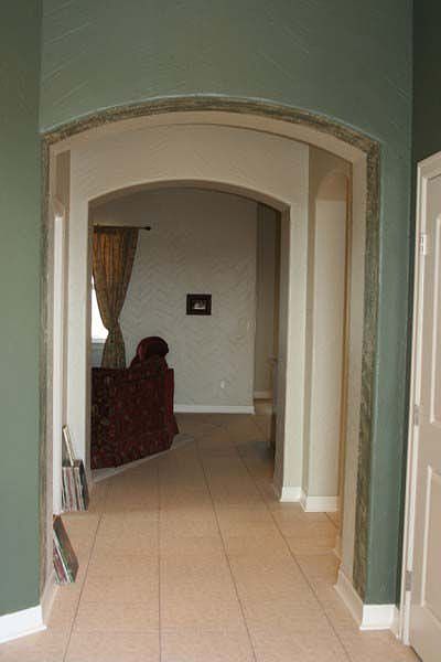 Archways and tiled entry