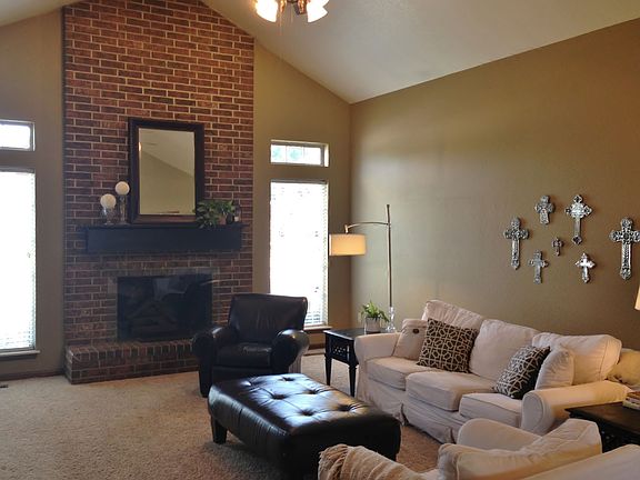Living Room with high ceilings with beam