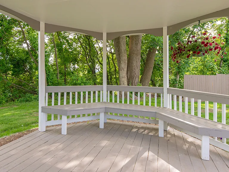 Unwind in our gazebo's cool shade, a perfect spot to escape the sun and savor moments of relaxation.