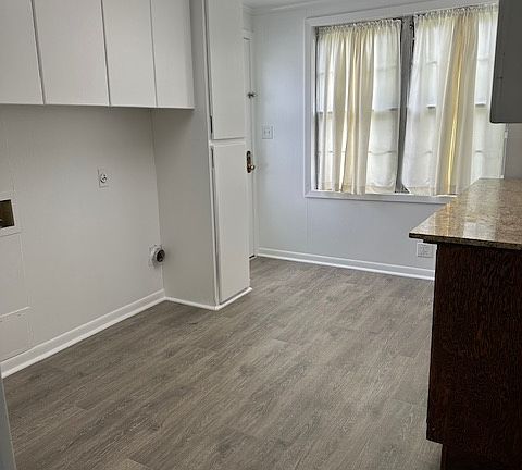 Utility room with washer/dryer connections - door to back yard & separate 2 car garage
