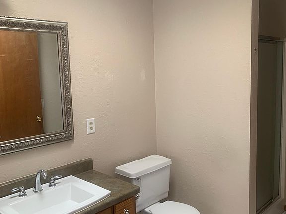 Master bath with shower and tub and double sink