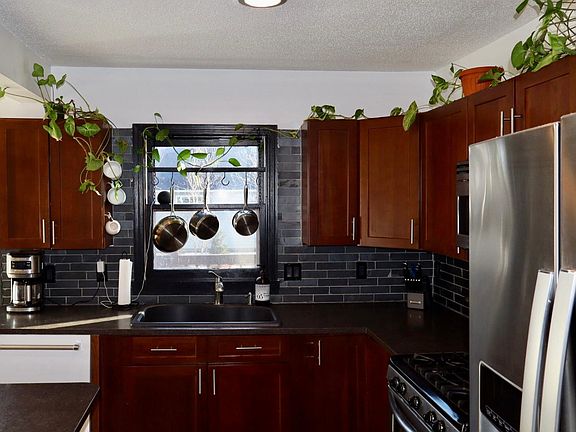 5th image of 615 Rice St W