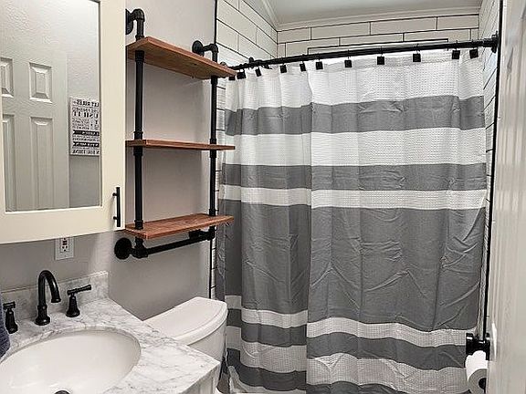 Bath with walk-in shower 