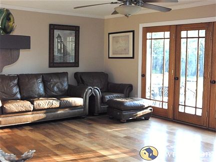 Den along back of home. Looks out to the w