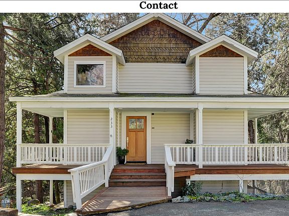 Front of the house has private driveway large enough for 3 small cars or two large cars/trucks