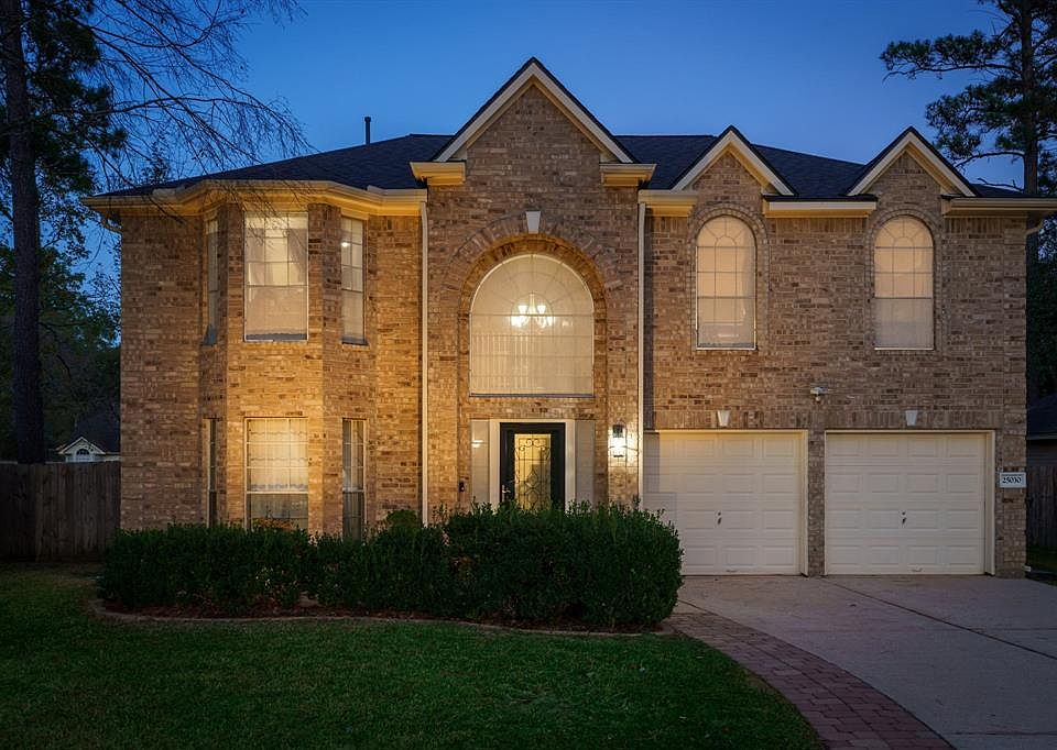 Beautiful front elevation with uplighting!