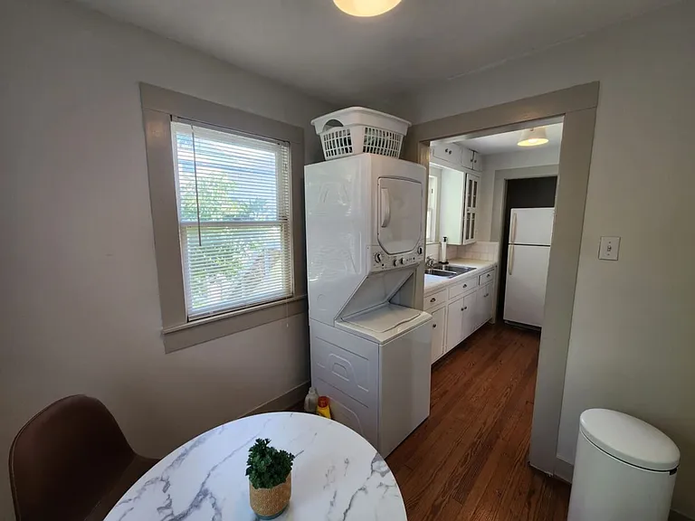 E 11th 1/2 St — Photo 9