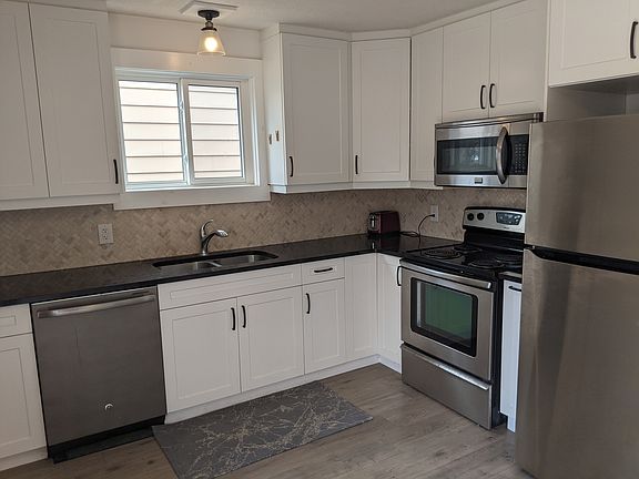 Kitchen has tons of storage and food prep space and is fully equipped with SS Appliances.