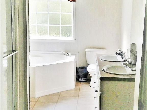 Master-Bathroom with Walk-In Shower, Garden Tub, Double Vani