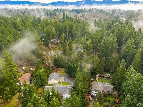 Aerial View of Home with Shop & Surrounding Area.